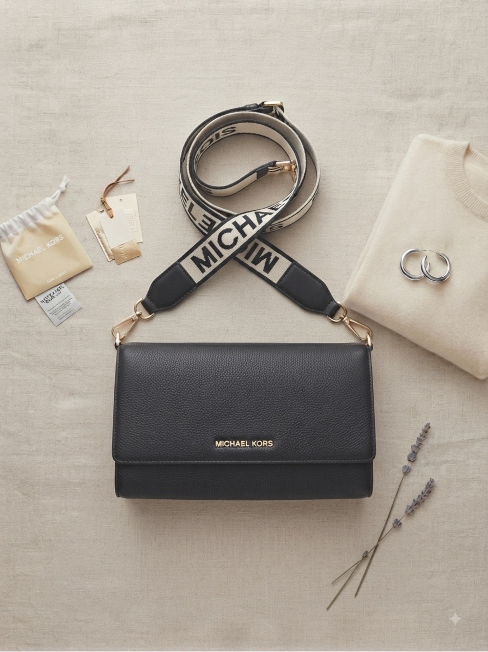 Michael Kors Black Jet Leather Crossbody with Cream Guitar Style Logo Strap.
